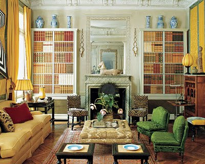 Rose Anne de Pampelonne library with yellow curtains and blue and white porcelain via belle vivir blog