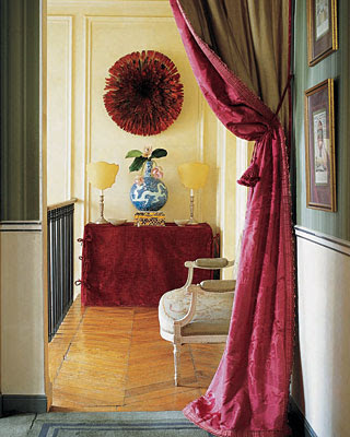 Rose Anne de Pampelonne's home Paris hallway with african hat on the wall via belle vivir blog