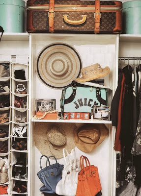 Pamela Skaist-Levy's closet with vintage louis vuitton suitcase and hermes bags designed by Peter Dunham via belle vivir blog