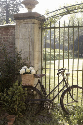 belmont grounds an english country house entry way with bike and flowers in basket