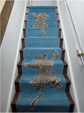 Climbing leaopard rug on stairs by Dianne von furstenberg via belle vivir blog