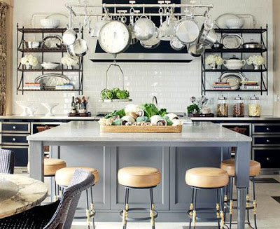 greay, white and black kitchen with pot rack