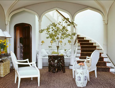 studded nailhead upholstered walls in home decor via belle vivir