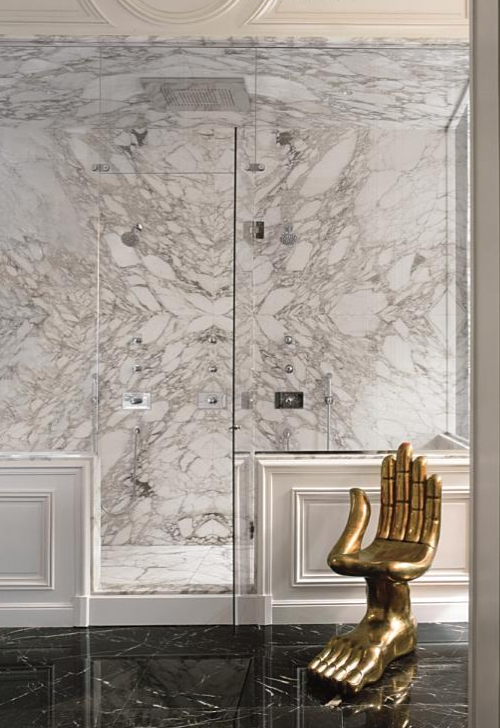 White marble Bathroom with Brass Fixture, lenny kravitz bathroom with pedro friedeberg chair