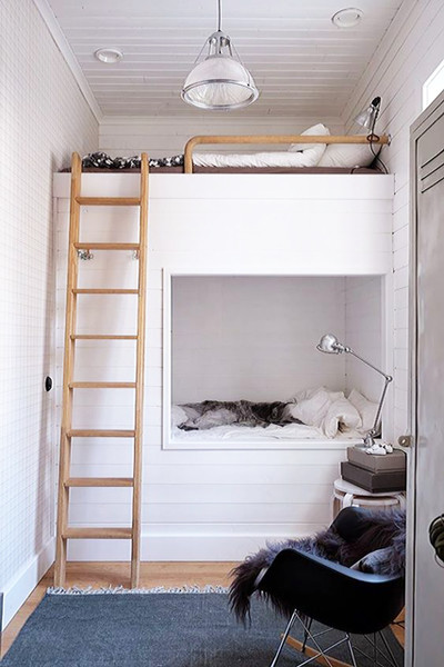 bunk beds covered with shiplap