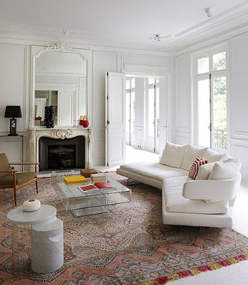 white livingroom with antique carpet