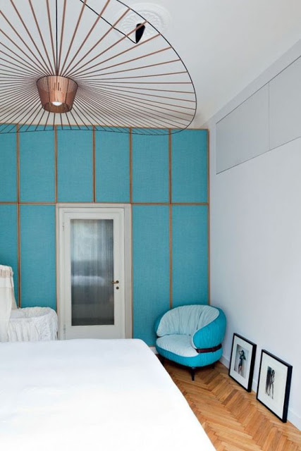 Pietro Russo design with blue walls chevron floor and constance guisset vertigo pendant