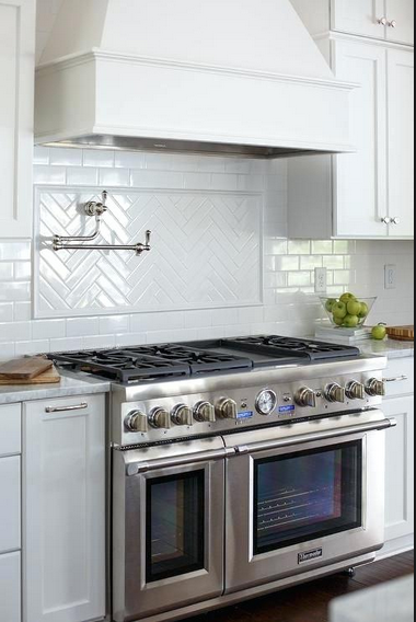 backsplash behind the stove, kitchen design, white herringbone backsplash, tile