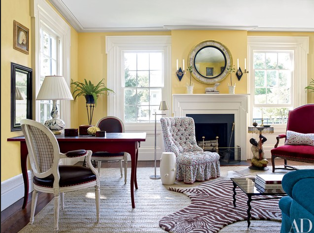Layered rugs in inteiors, yellow living room with layered rugs, Christopher Spitzmiller