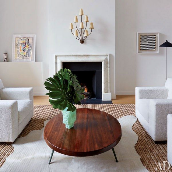 Layering rugs, sisal rug with cowhide, D'Apostrophe Design