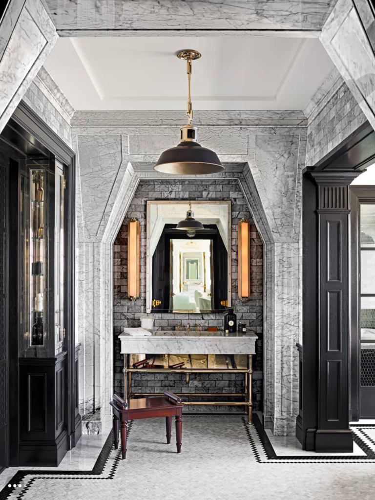 Mary McDonald design, marble bathroom with black cabinetry