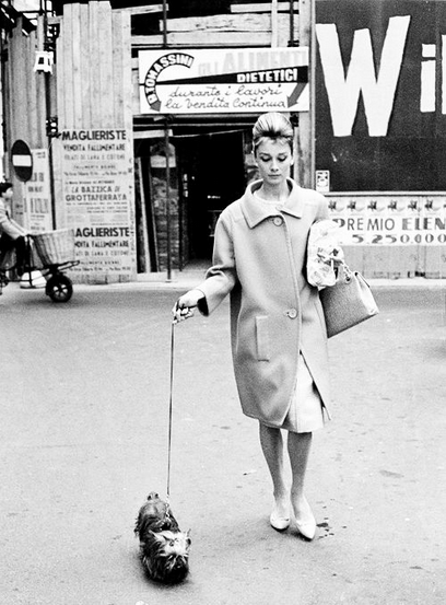 Audrey Hepburn in oversized coat