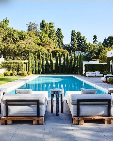 swimming pool with modern rustic chaise lounge