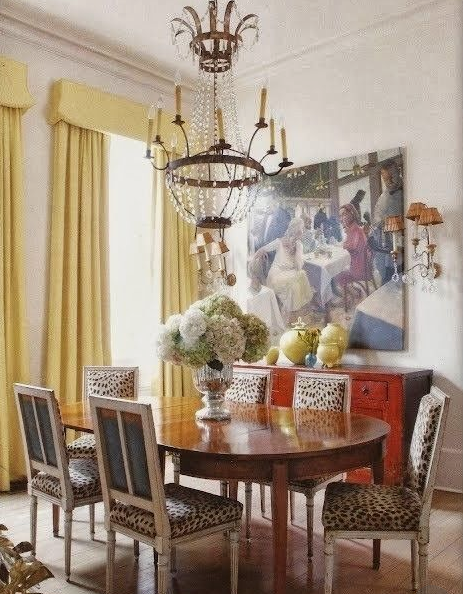 yellow curtains, leopard upholstered dining chairs
