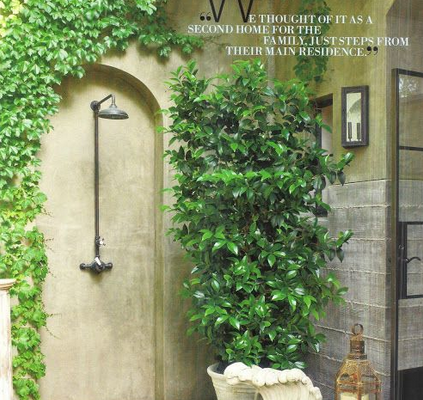 mediterrenean outdoor shower with ivy tree and grable foor