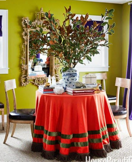 Orange round skirted table in Sam Allen's home