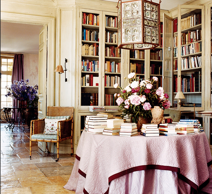 Pink tablecloth on a round table skirt in Janet de Botton's home