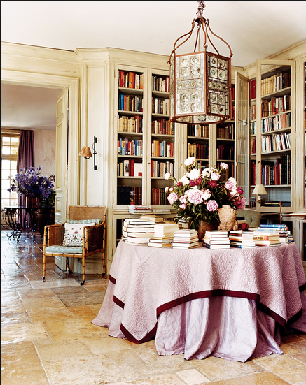 Pink tablecloth on a round table in Janet de Botton's home
