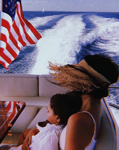 Erika Bearman in a boat with daughter