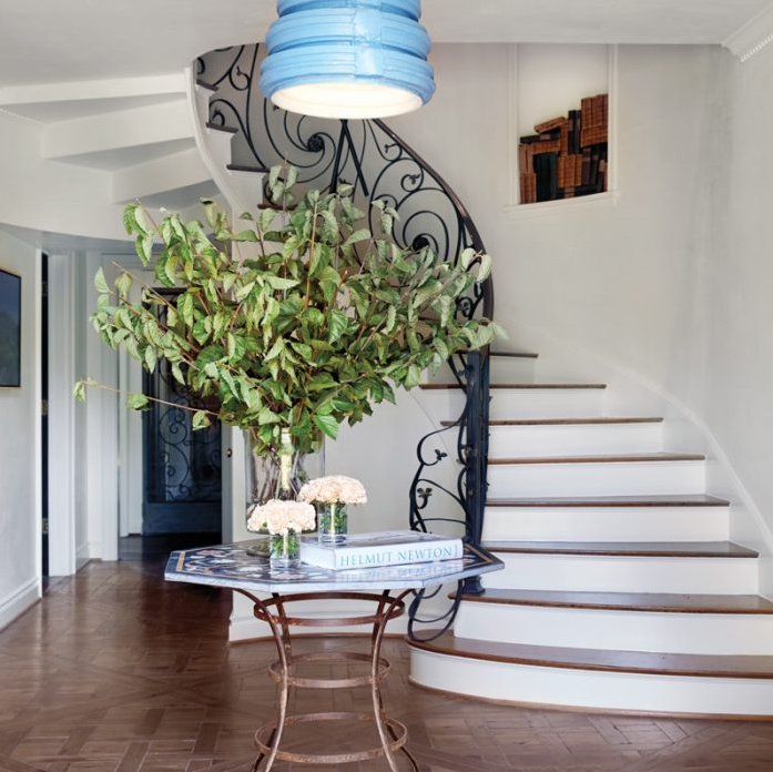 entryway with metal railing, Parisian chic