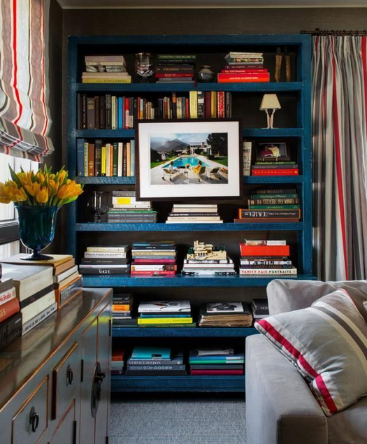 how to style bookshelves, colorful objects and books