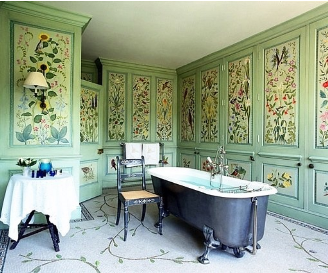 botanical prints in a green bathroom