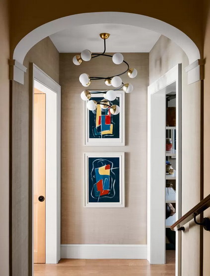 manhattan design hallway upholstered in sisal wallpaper