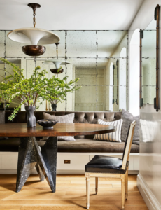 Nate Berkus Dining Room - Tiffany Leigh Interior Design: A Library in the Dining Room - Wool upholstering walls in wool gives the room a cozy, intimate feel.